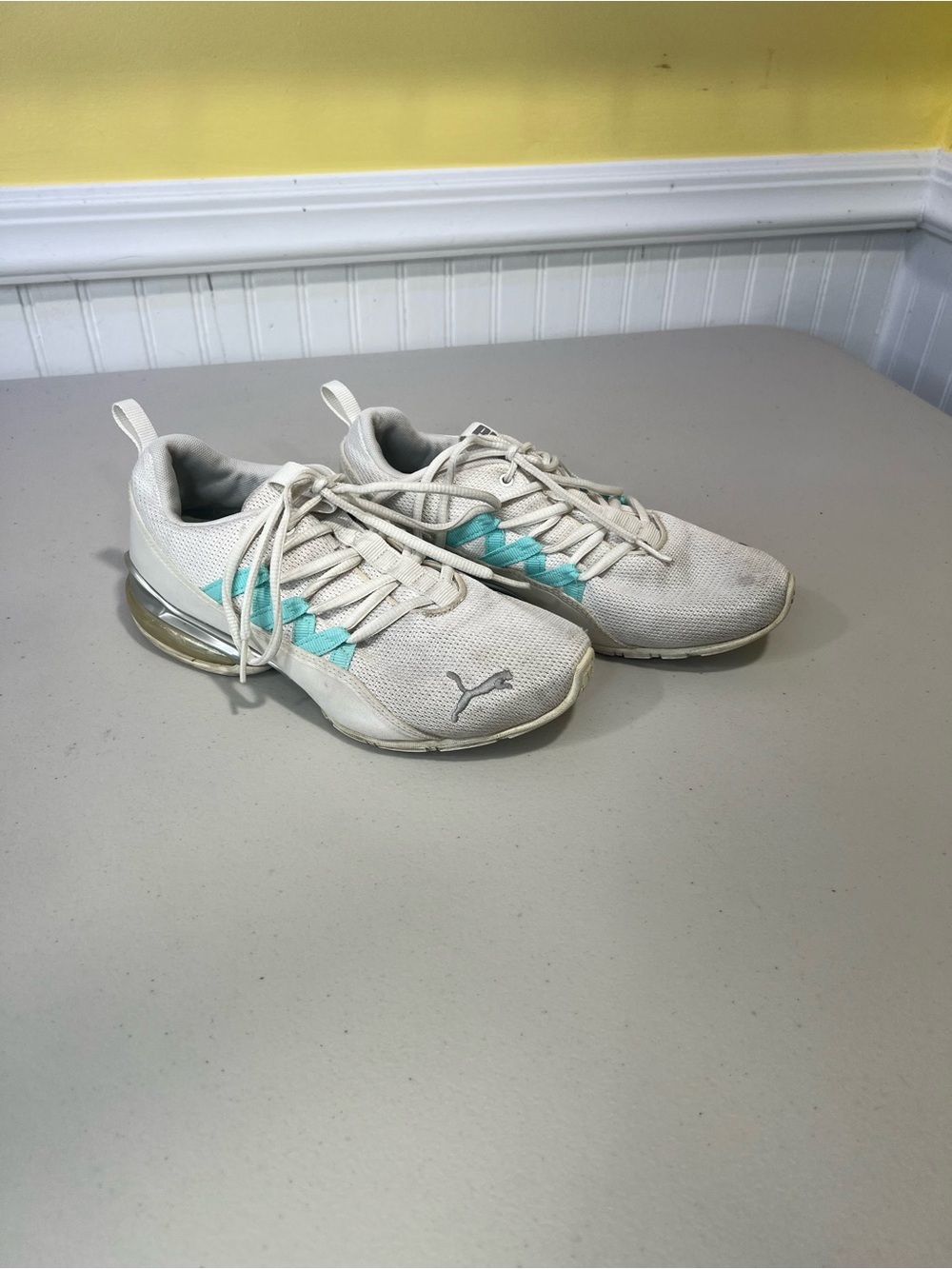 Puma Kids White Sneakers with Teal Accents